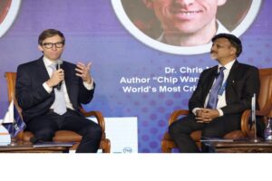 Chris Miller, Author participating in ‘Chip Pe Charcha’ with Dr. Satya Gupta, President, VLSI Society of India